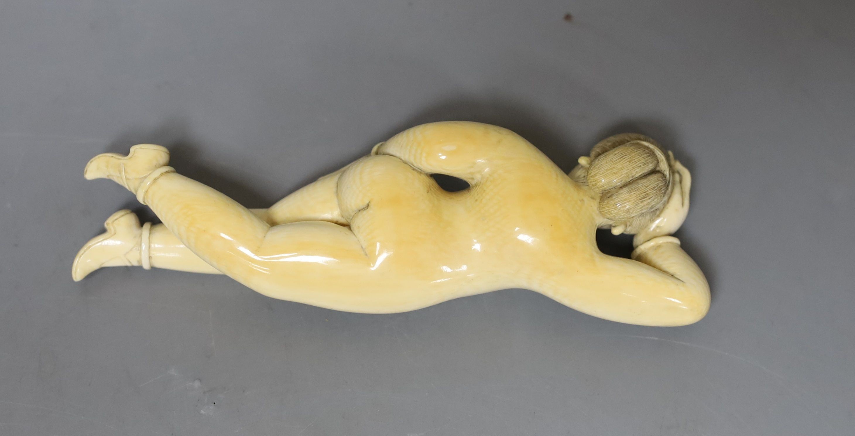 A 19th century Chinese carved ivory medicine doll, 15cm